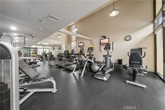 a view of a chairs and tables in the balcony