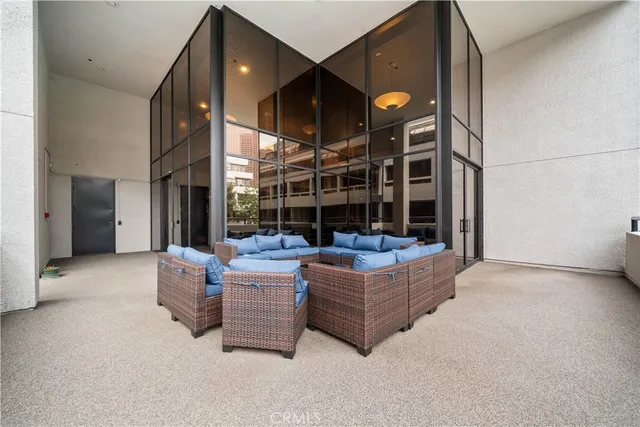 a view of a swimming pool with chairs