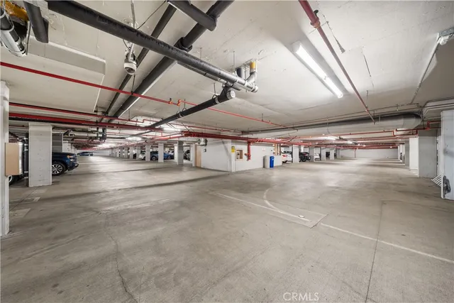 an aerial view of residential building and parking space