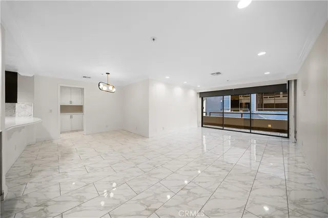 a view of a kitchen with a sink