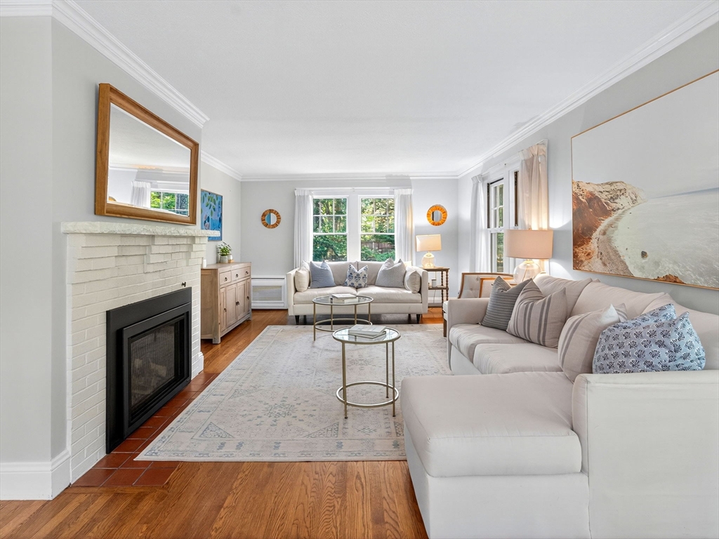 8 Old Town Road Wellesley, MA 02481 - Photo 3 of 18 a living room with furniture and a fireplace