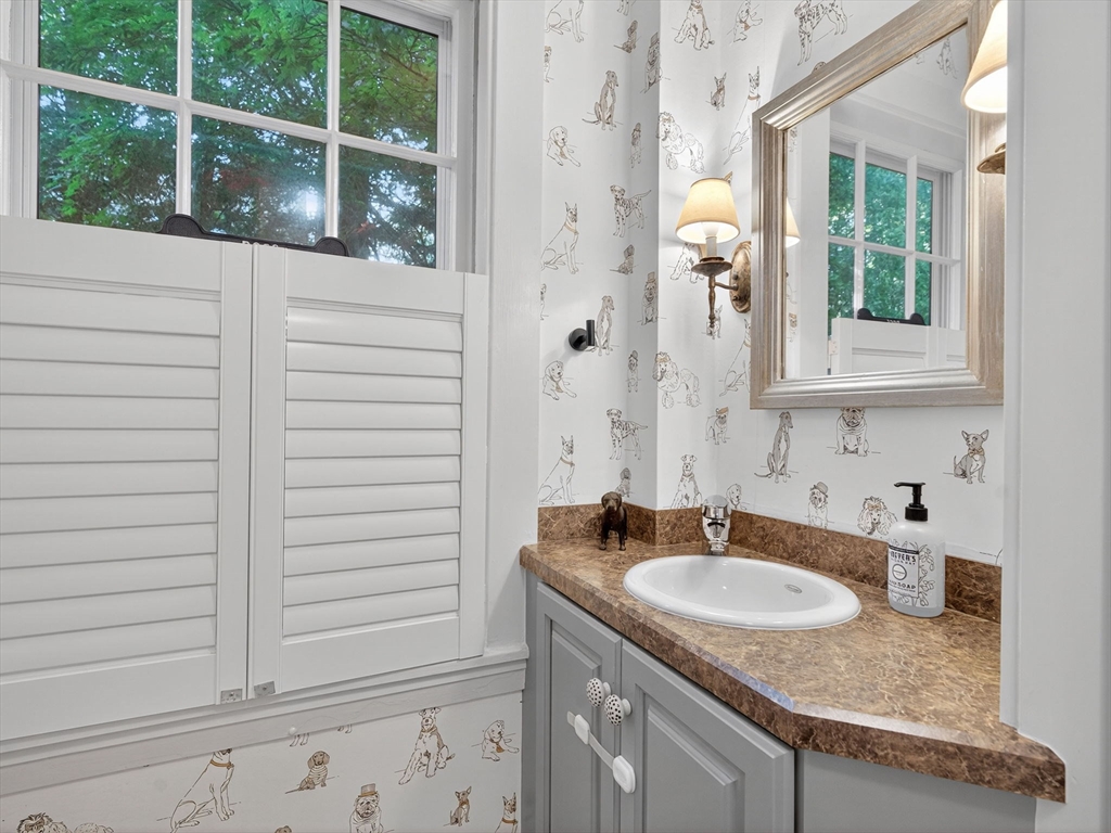 8 Old Town Road Wellesley, MA 02481 - Photo 8 of 18 a bathroom with a granite countertop sink and a window