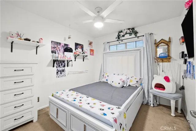 a bedroom with a bed and a cabinets