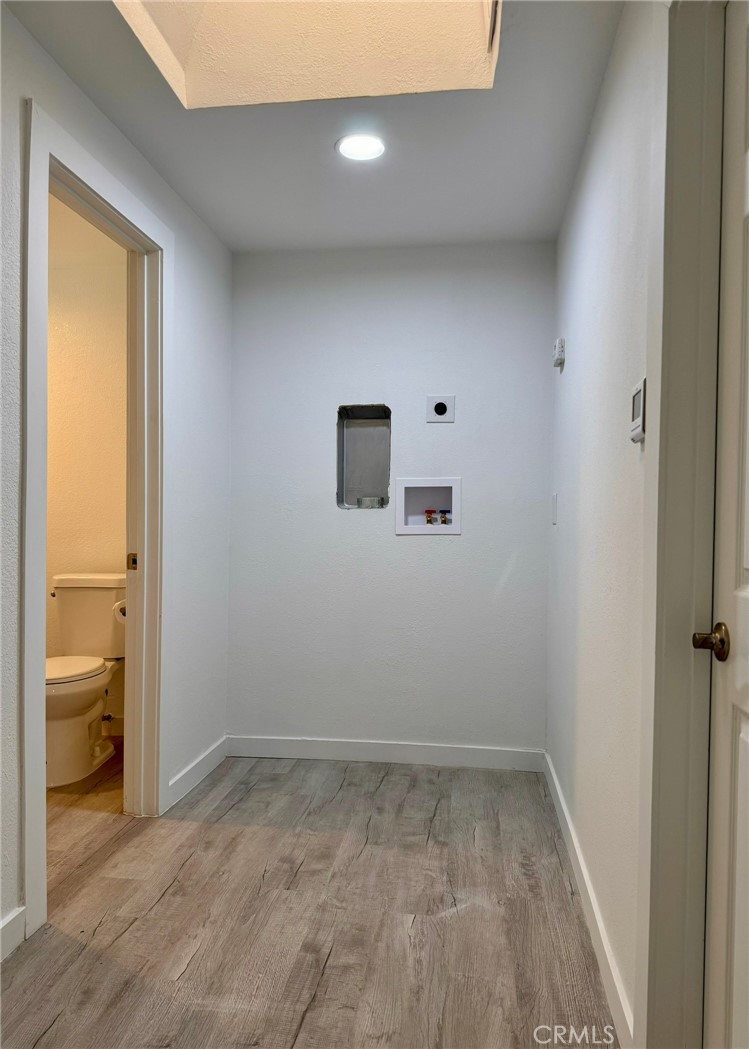 1362 South Downey Road Los Angeles, CA 90023 - Photo 19 of 30 Hallway to bedroom 3, restroom and washer/dryer