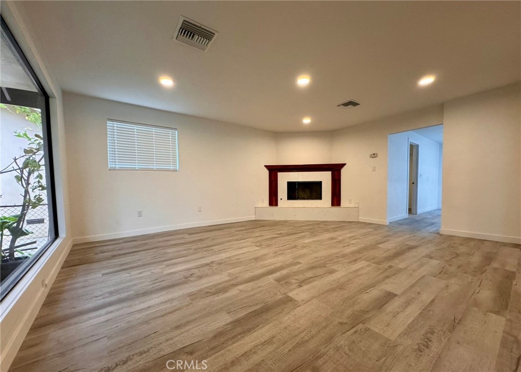 1362 South Downey Road Los Angeles, CA 90023 - Photo 5 of 30 Front room and fireplace