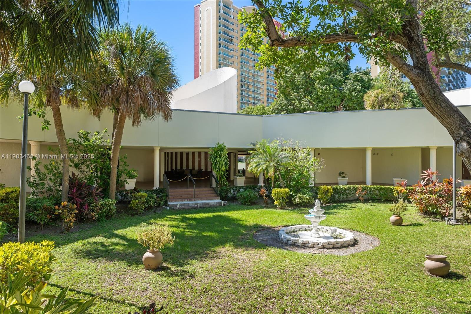 17021 North Bay Road, Unit 516 Sunny Isles Beach, FL 33160 - Photo 13 of 14 a view of back yard of the house