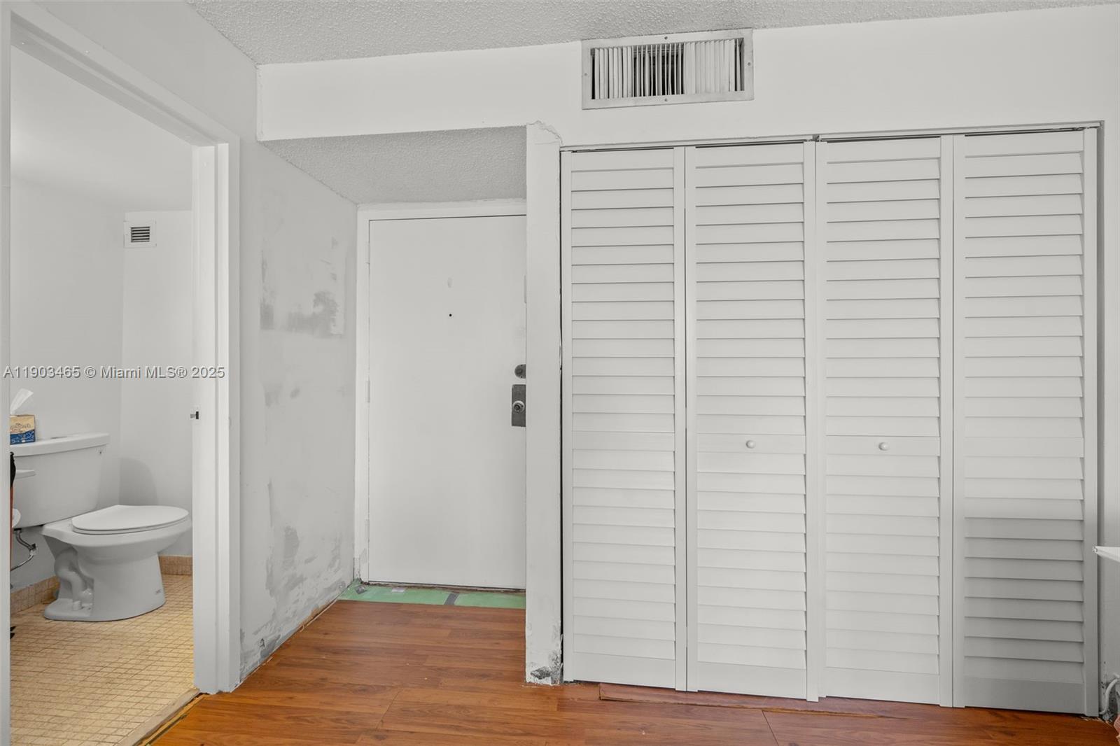 17021 North Bay Road, Unit 516 Sunny Isles Beach, FL 33160 - Photo 9 of 14 a bathroom with a toilet