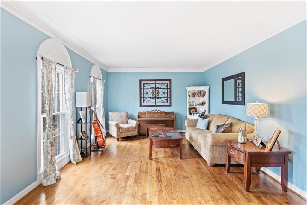 20 Pine Valley Road Rome, GA 30165 - Photo 12 of 36 a living room with furniture and a wooden floor