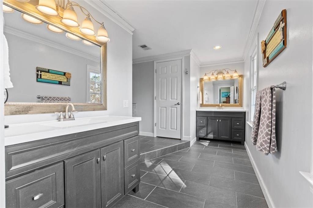 20 Pine Valley Road Rome, GA 30165 - Photo 13 of 36 a spacious bathroom with a sink a mirror and a shower