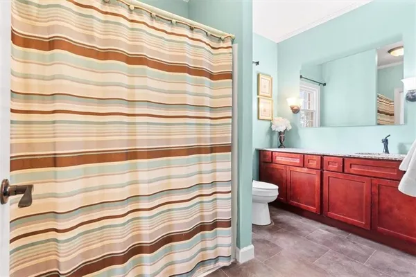 a bathroom with a sink and a toilet