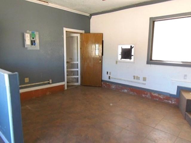 2218 Joliet Street Plainview, TX 79072 - Photo 3 of 9 a view of an empty room with window