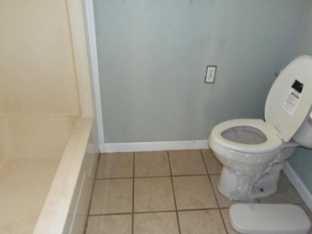 2218 Joliet Street Plainview, TX 79072 - Photo 9 of 9 a bathroom with a sink and a toilet