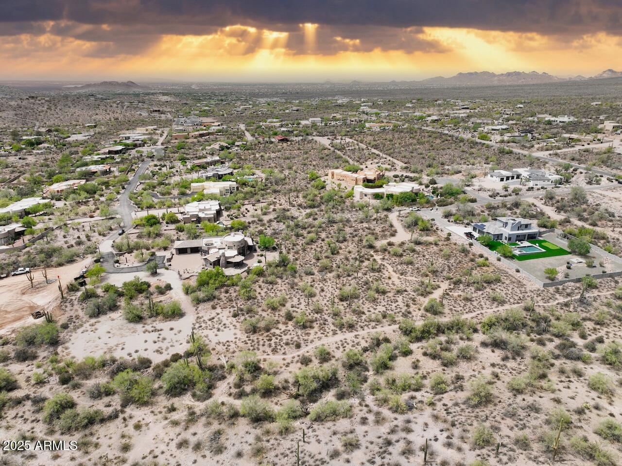 0 South Buckboard Road, Unit 2 Gold Canyon, AZ 85118 - Photo 11 of 17 an aerial view of residential houses with outdoor space