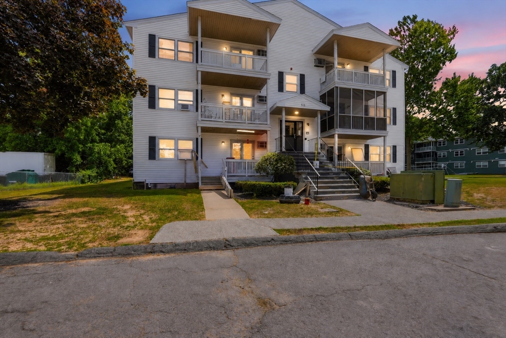 30 Abbey Road, Unit 102 Leominster, MA 01453 - Photo 2 of 15 a view of a house with swimming pool
