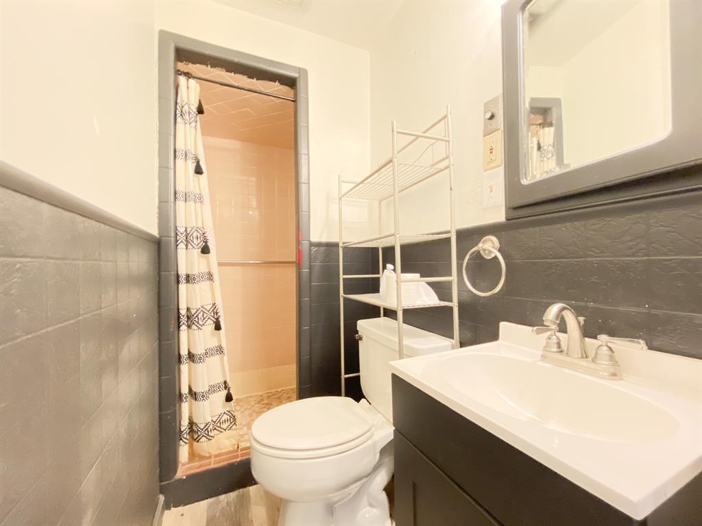 211 Paloma Street Winters, TX 79567 - Photo 15 of 19 a bathroom with a sink toilet and shower