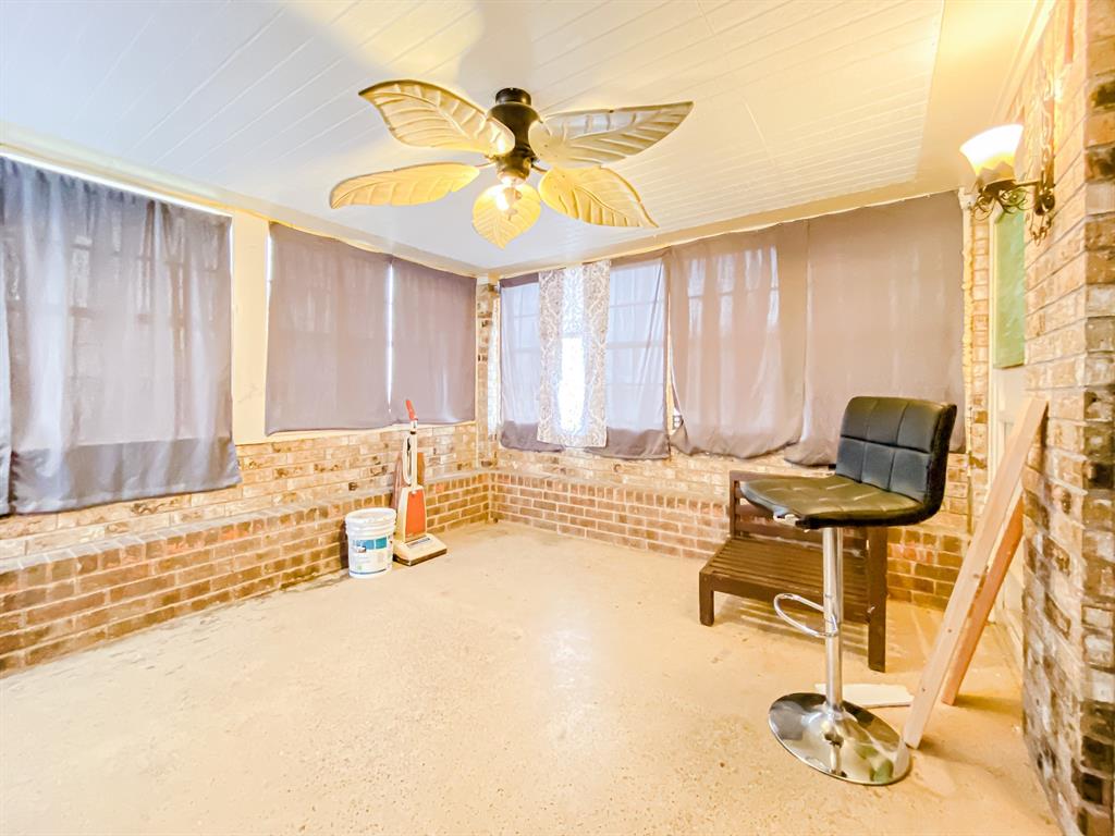 211 Paloma Street Winters, TX 79567 - Photo 16 of 19 a view of a livingroom with furniture and a window