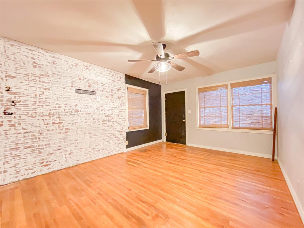 211 Paloma Street Winters, TX 79567 - Photo 3 of 19 a view of an empty room with a window