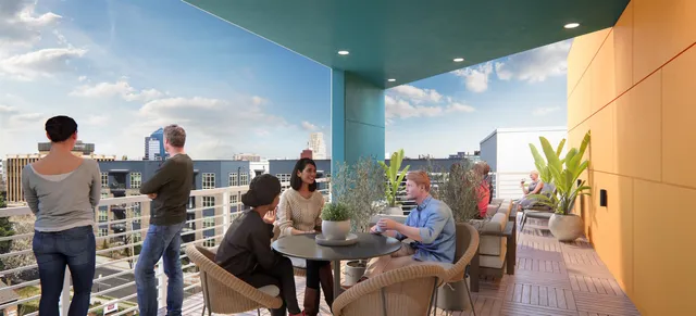 a bathroom with a sink a toilet a light fixture and mirror