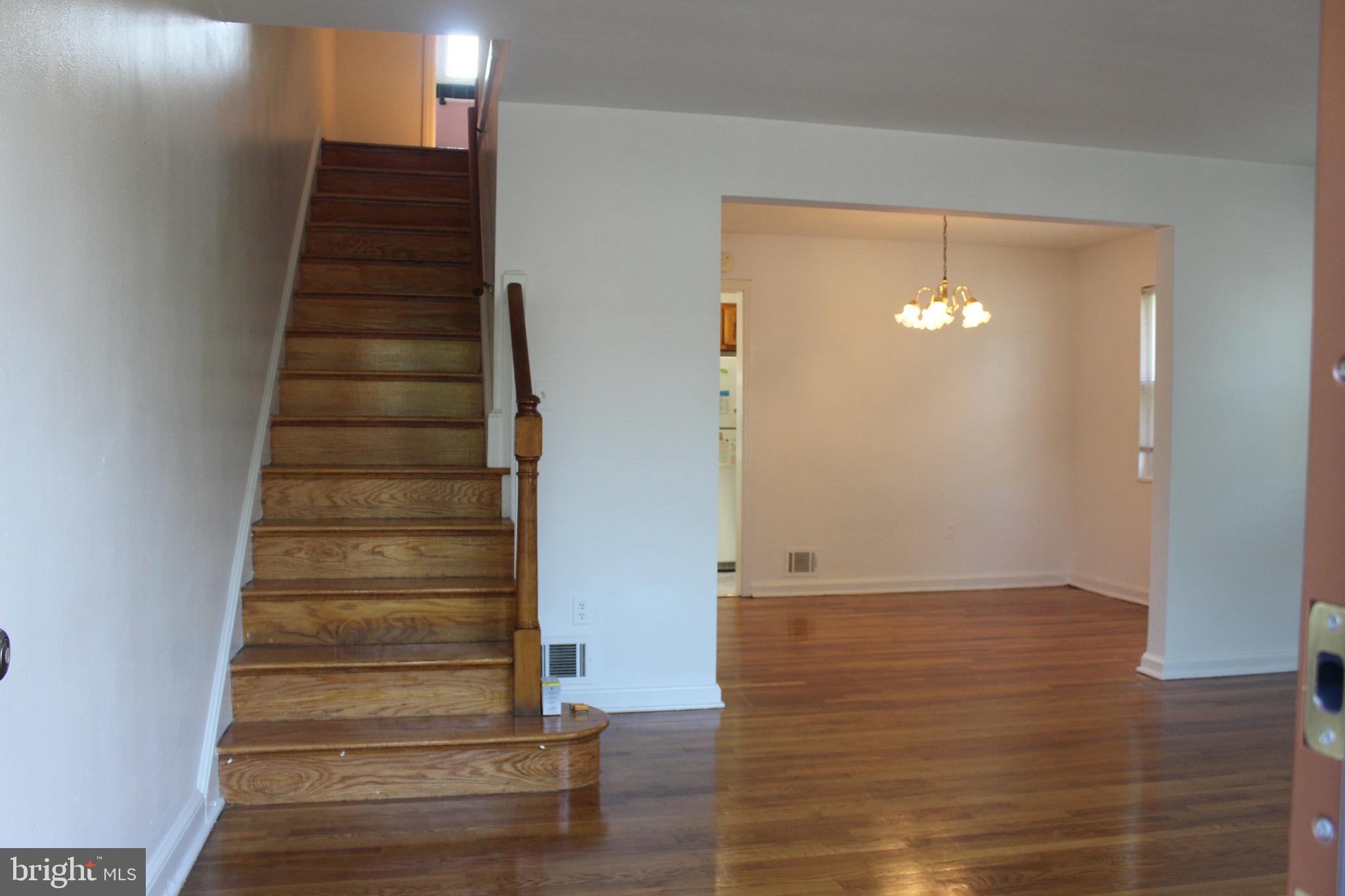 5006 Sargent Road Northeast Washington, DC 20017 - Photo 2 of 22 Living Room stairs to upper level