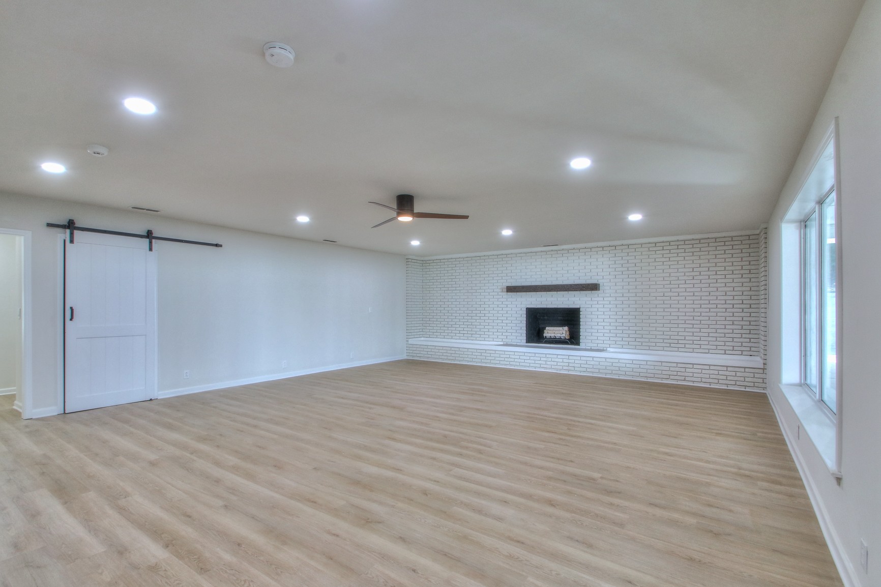 301 Davidson Drive Franklin, TN 37064 - Photo 29 of 43 a view of an empty room with wooden floor and a window