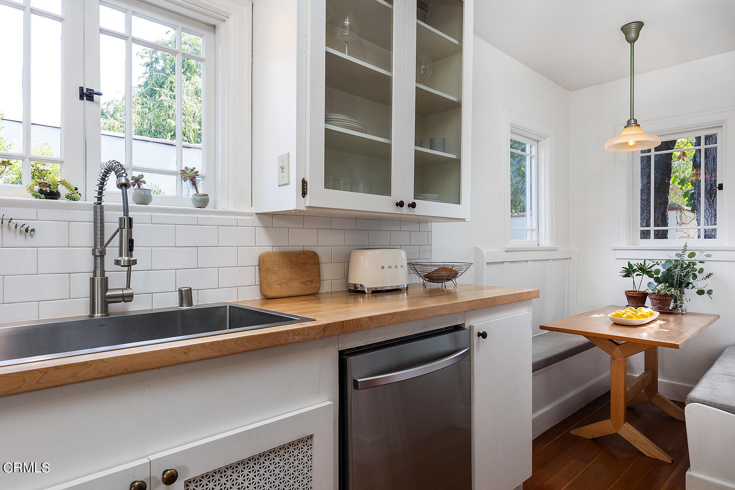 546 Douglas Street Pasadena, CA 91104 - Photo 16 of 36 a kitchen with a sink cabinets and window