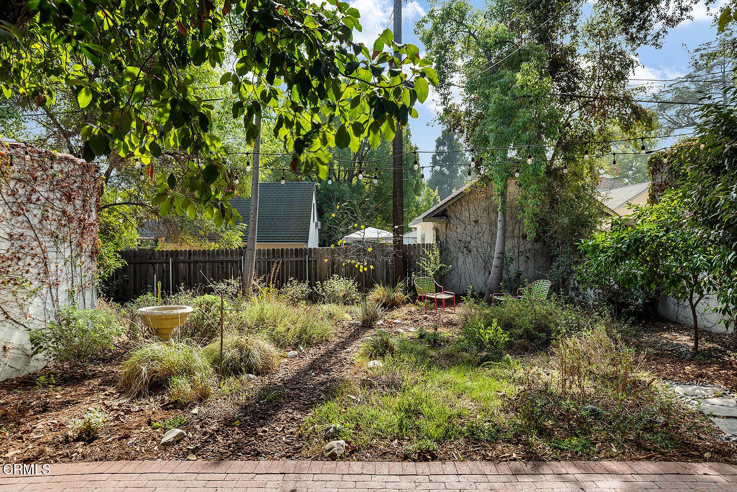 546 Douglas Street Pasadena, CA 91104 - Photo 34 of 36 a backyard of a house with lots of green space