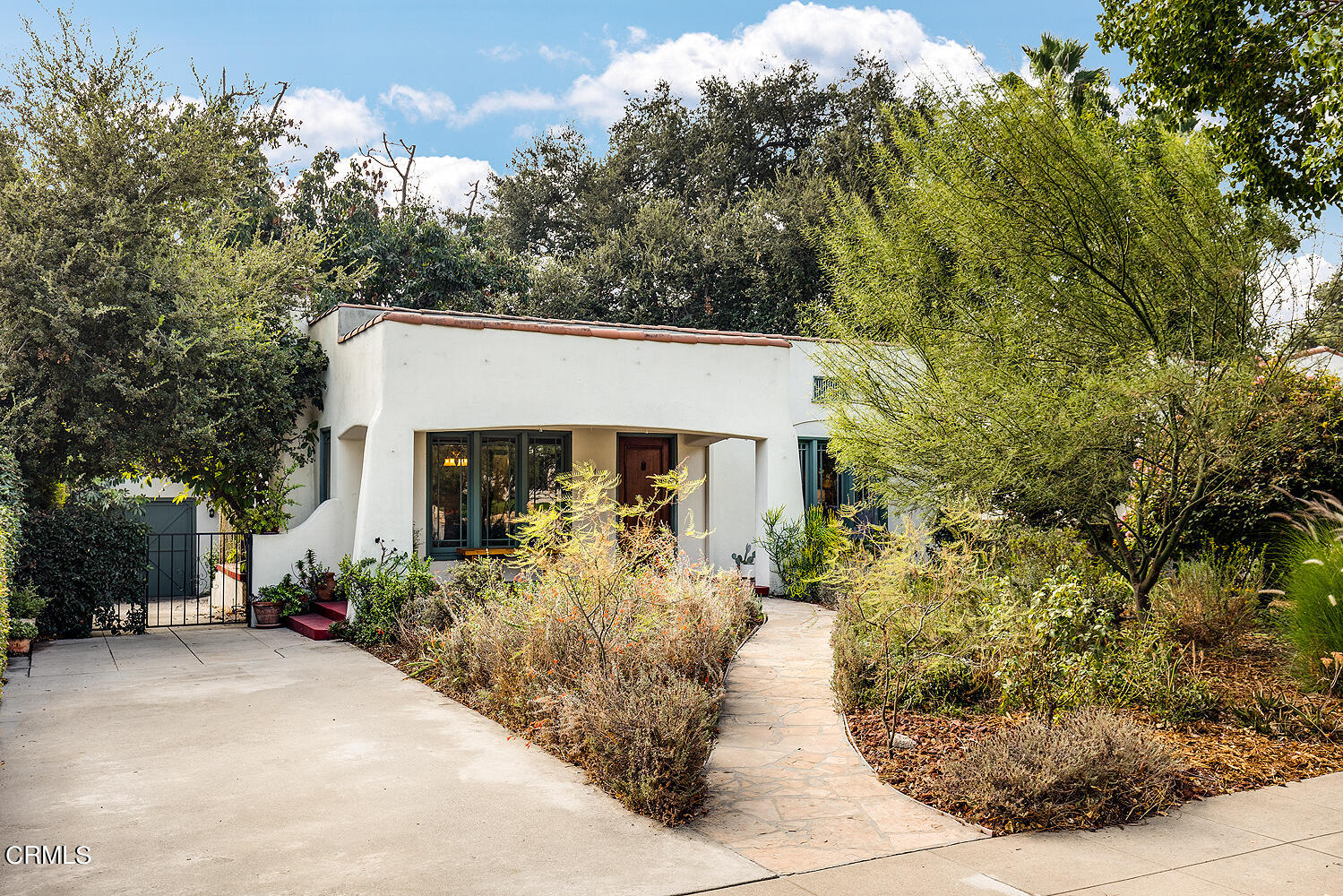 546 Douglas Street Pasadena, CA 91104 - Photo 35 of 36 a front view of a house with a yard and garage