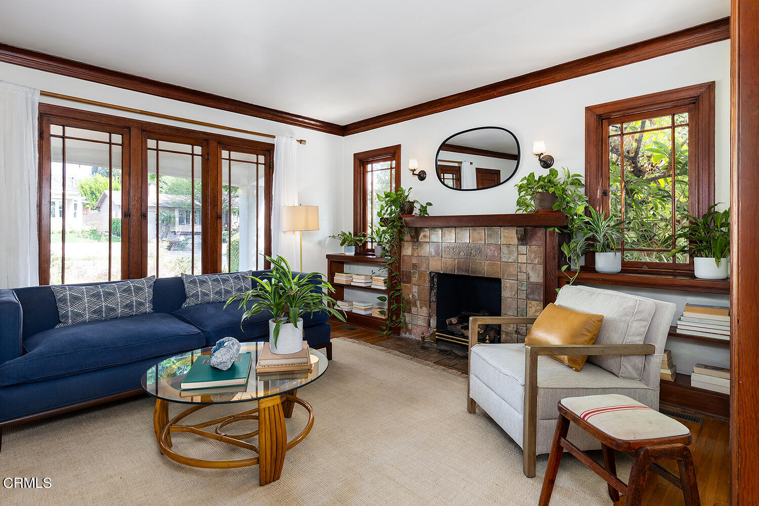 546 Douglas Street Pasadena, CA 91104 - Photo 8 of 36 a living room with furniture a fireplace and a large window