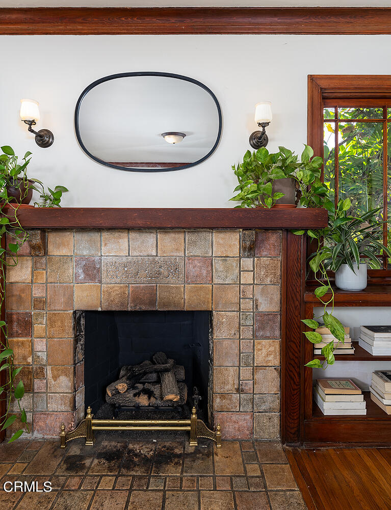 546 Douglas Street Pasadena, CA 91104 - Photo 9 of 36 a front view of a fireplace with wooden floor