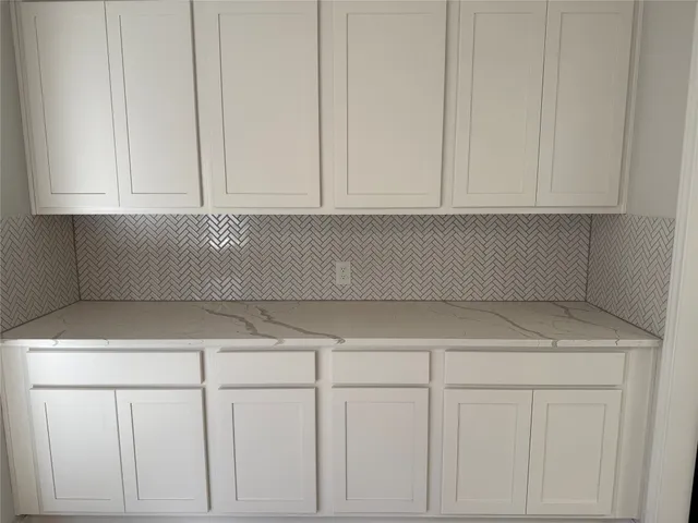 a view of white cabinets