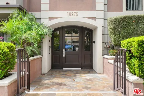 a front view of a house with a porch