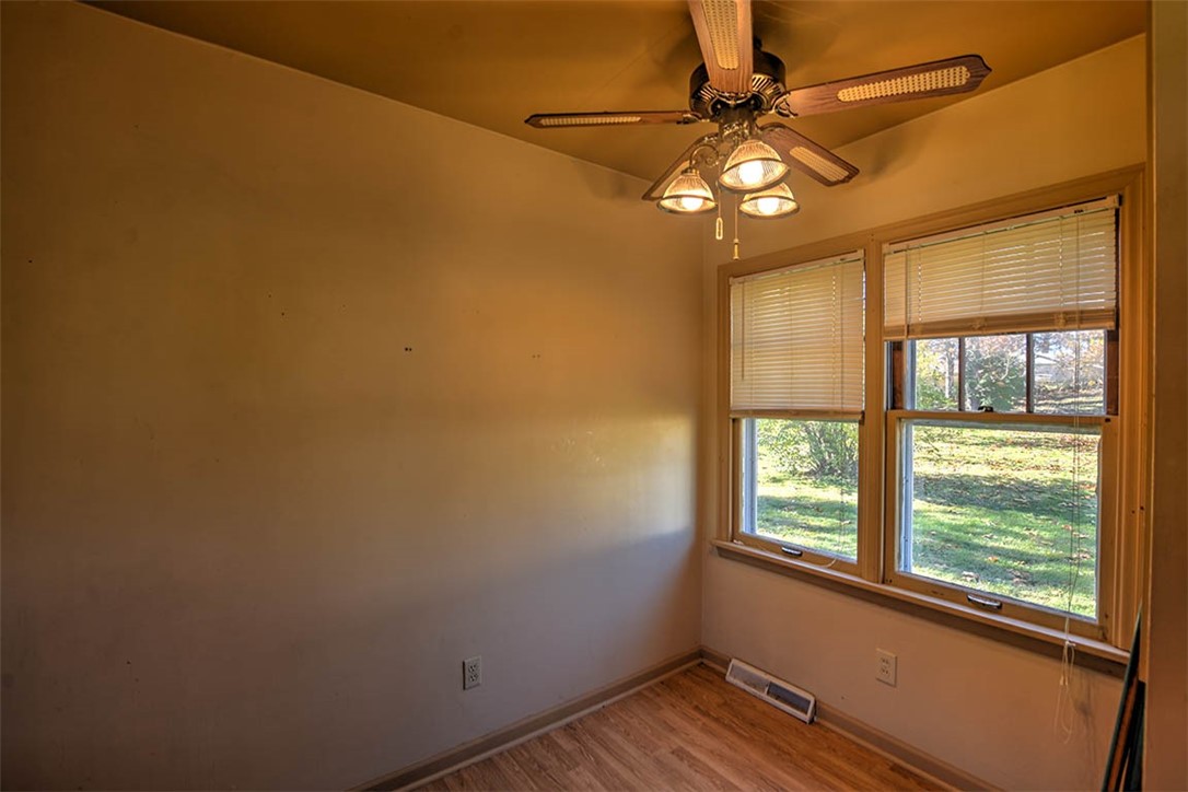1765 South Fairview Avenue Decatur, IL 62521 - Photo 13 of 24 a view of an empty room with a window
