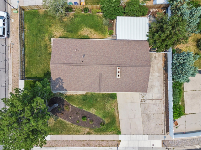 2693 Teal Way Sandy, UT 84093 - Photo 49 of 50 Property featuring a brown shingle roof, a concrete driveway, and a detached metal carport