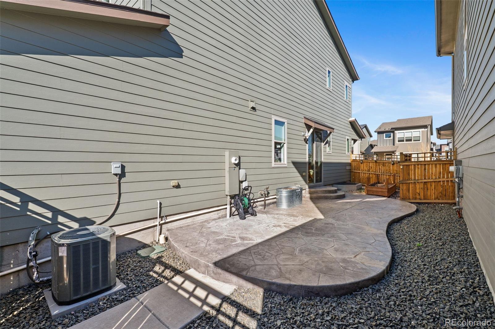 6817 Clay Street Denver, CO 80221 - Photo 26 of 41 a house view with a backyard space