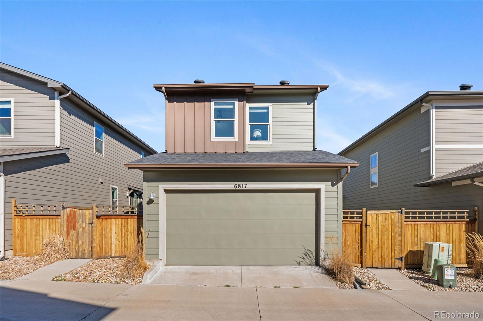 6817 Clay Street Denver, CO 80221 - Photo 27 of 41 a view of a house with a garage