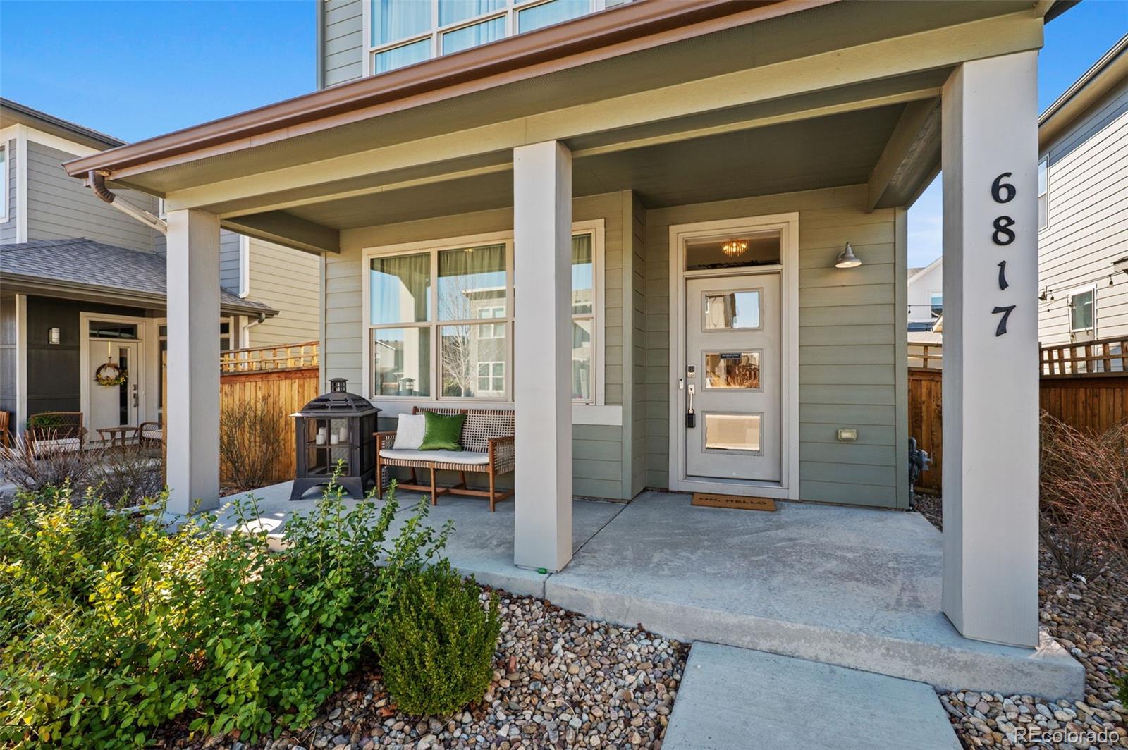 6817 Clay Street Denver, CO 80221 - Photo 3 of 41 a view of a house with porch