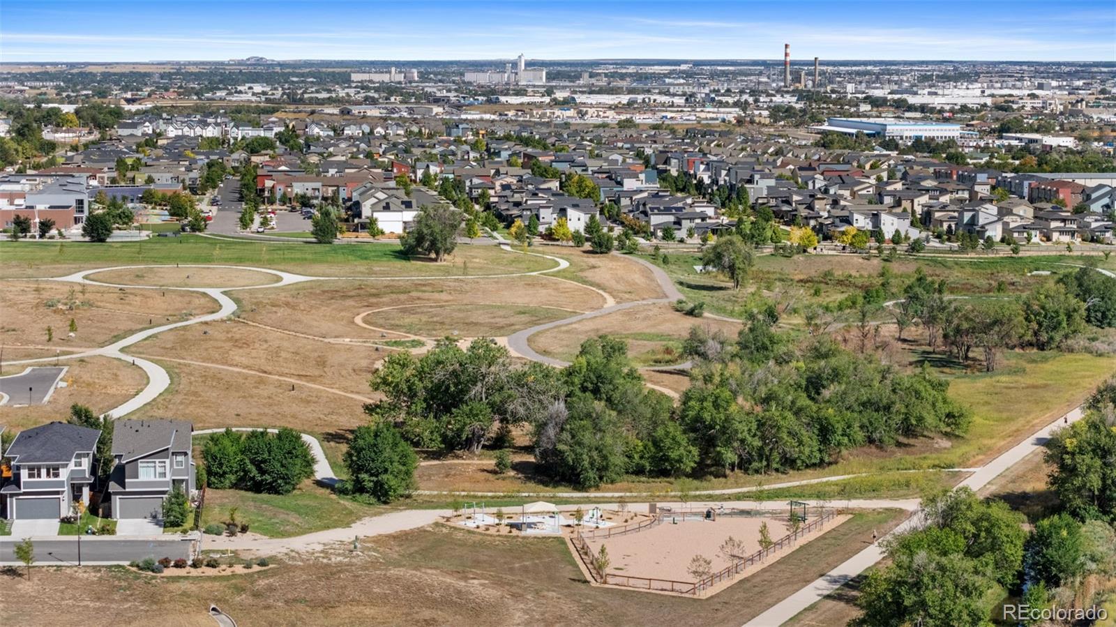 6817 Clay Street Denver, CO 80221 - Photo 33 of 41 an aerial view of residential houses with outdoor space and trees