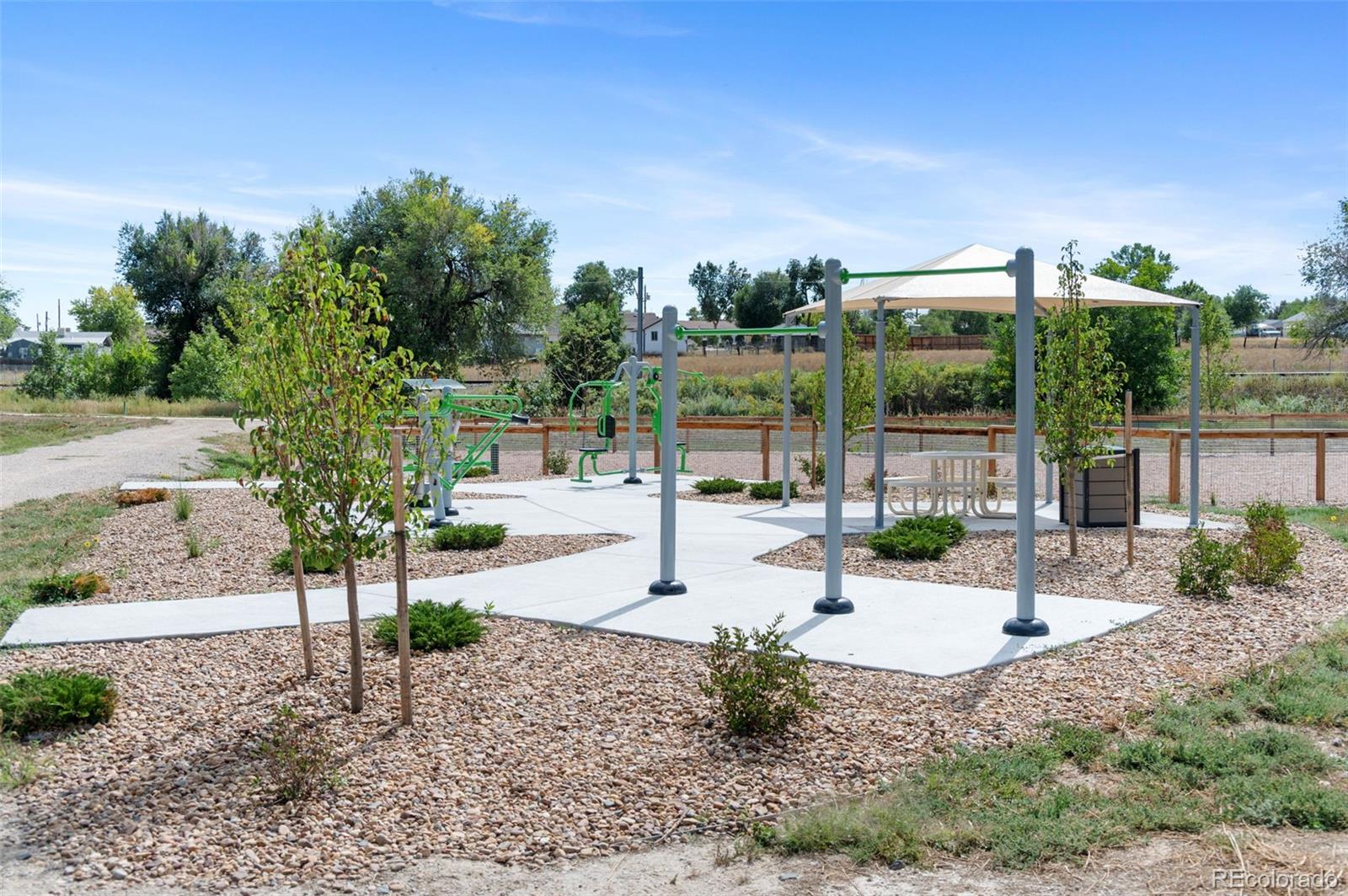 6817 Clay Street Denver, CO 80221 - Photo 35 of 41 a swimming pool with outdoor seating and yard