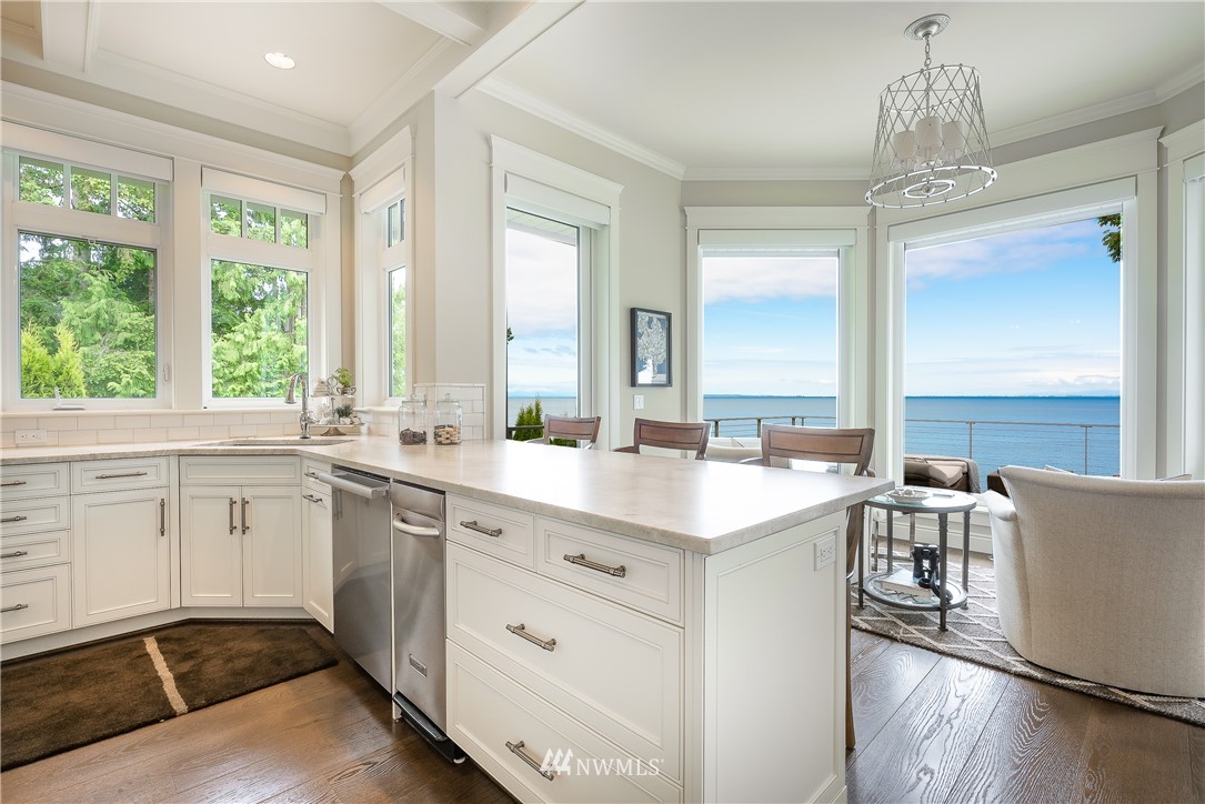 8745 Oertel Drive Blaine, WA 98230 - Photo 11 of 40 a kitchen with a sink stove and cabinets