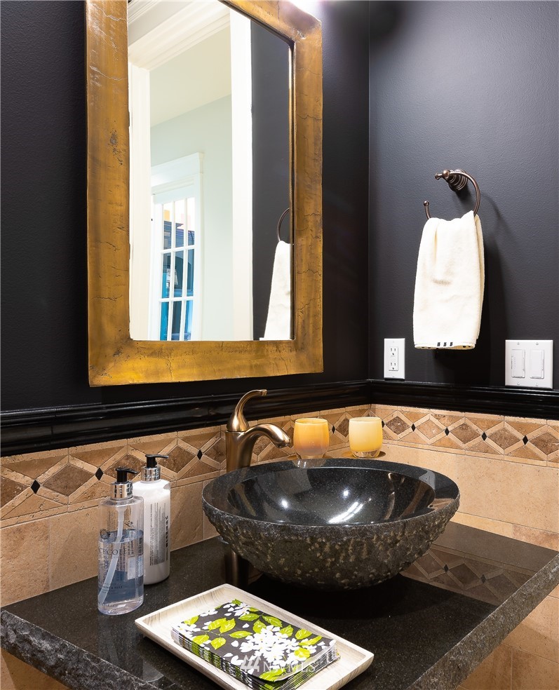 8745 Oertel Drive Blaine, WA 98230 - Photo 19 of 40 a bathroom with a sink and a mirror