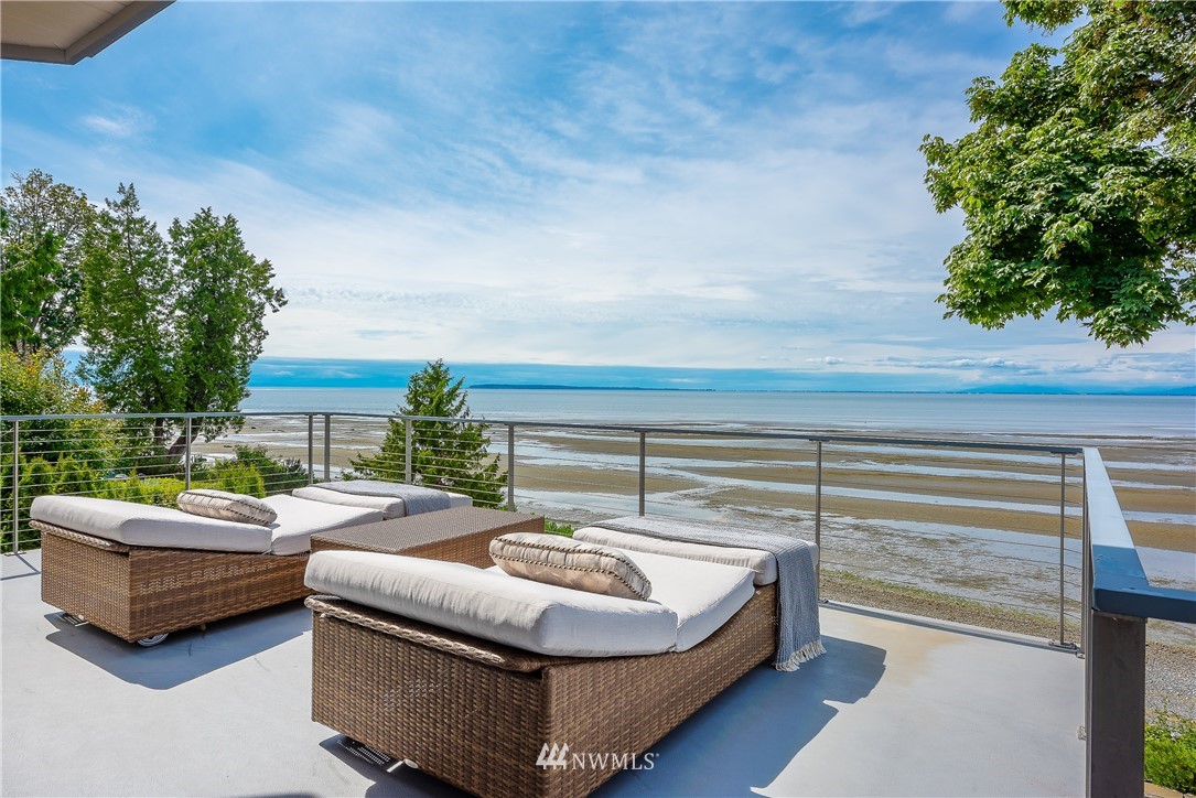 8745 Oertel Drive Blaine, WA 98230 - Photo 21 of 40 a balcony with furniture and a potted plant