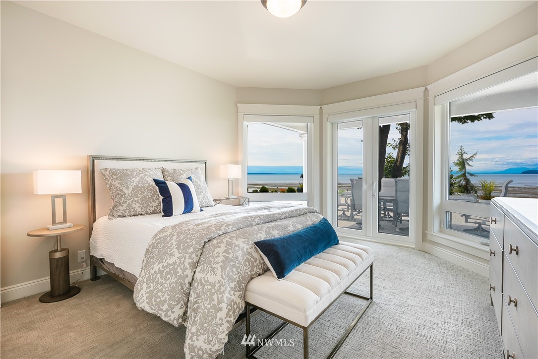 8745 Oertel Drive Blaine, WA 98230 - Photo 27 of 40 a spacious bedroom with a bed and a couch