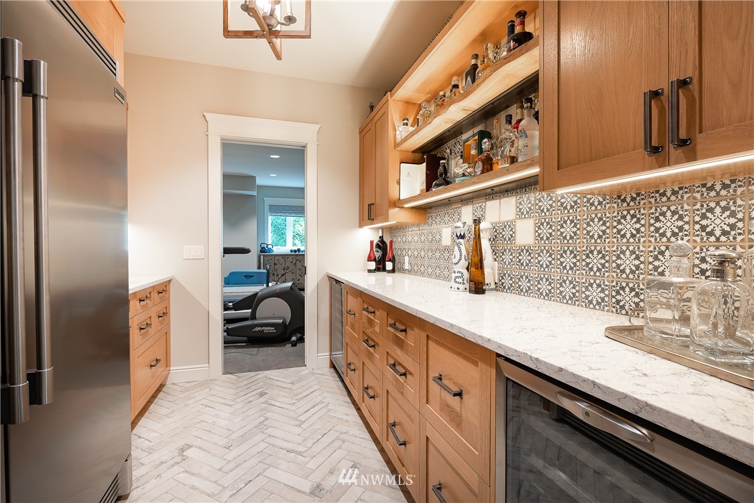 8745 Oertel Drive Blaine, WA 98230 - Photo 29 of 40 a spacious bathroom with a double vanity sink and a mirror