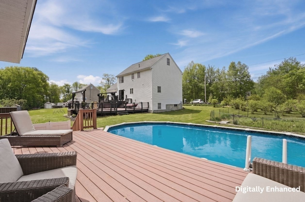 160 Gray Road Templeton, MA 01468 - Photo 7 of 42 a view of a swimming pool with a patio
