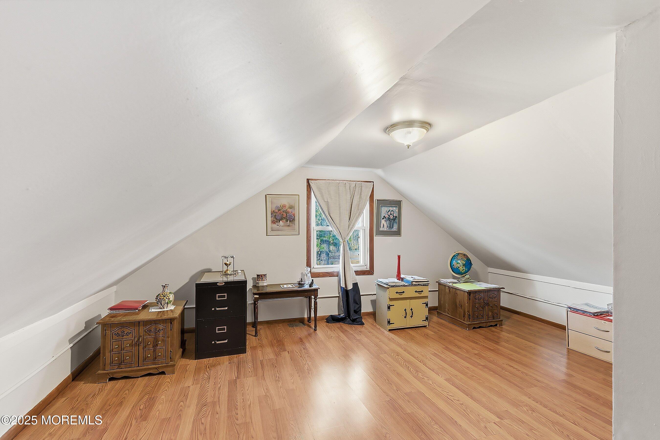 491 Lakehurst Road Browns Mills, NJ 08015 - Photo 12 of 15 a living room with furniture and wooden floor