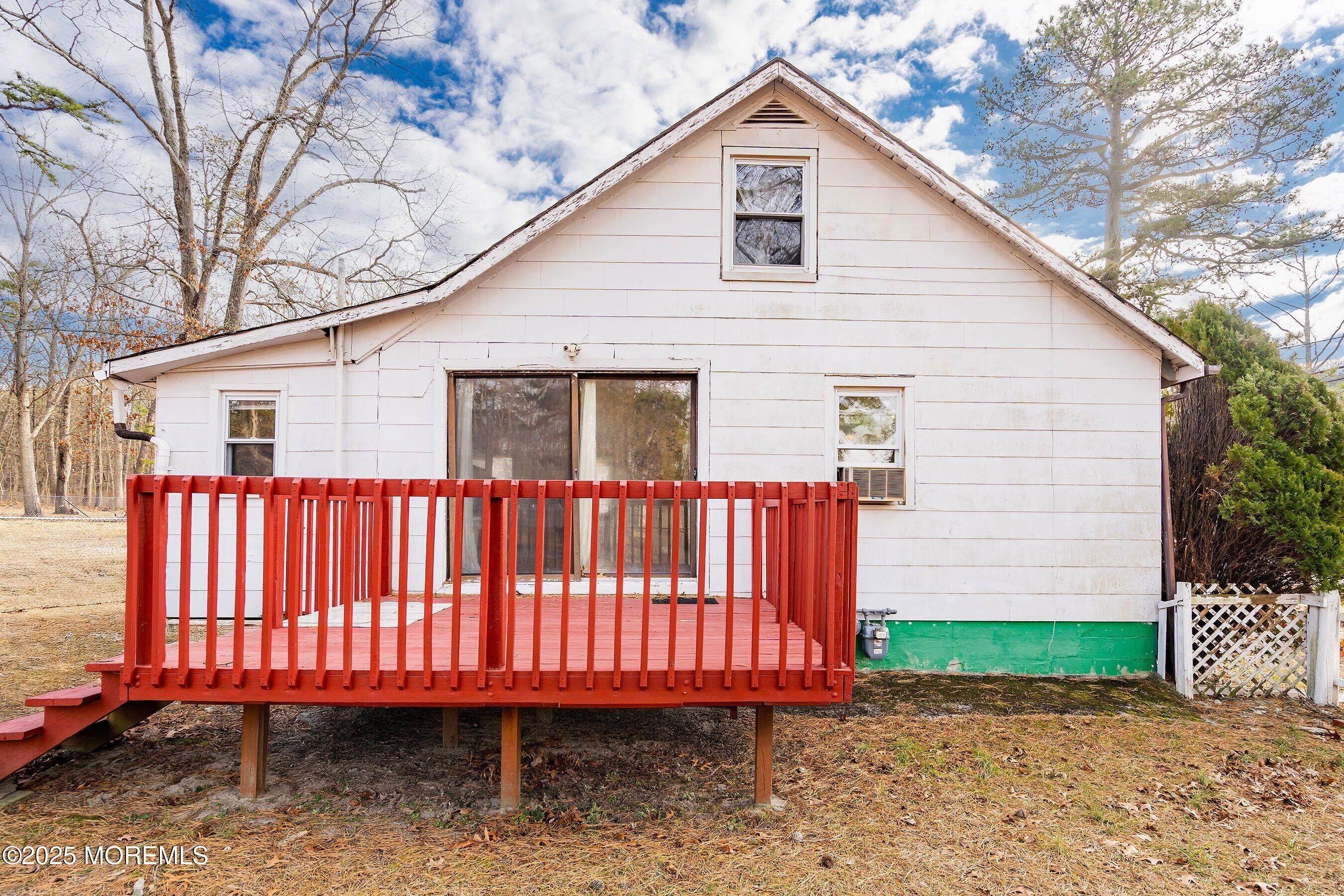 491 Lakehurst Road Browns Mills, NJ 08015 - Photo 2 of 15 a view of a small house with backyard