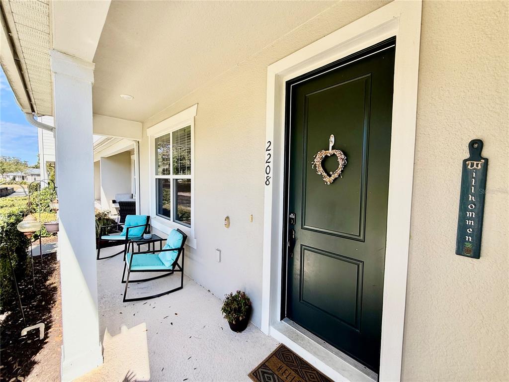 2208 Gopher Tortoise Terrace Oakland, FL 34787 - Photo 3 of 50 a view of kitchen with furniture and a refrigerator