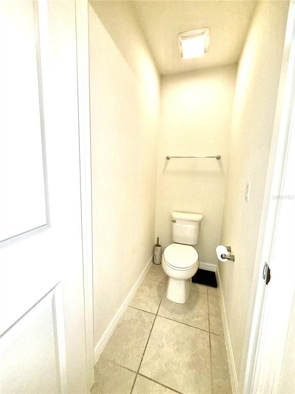 2208 Gopher Tortoise Terrace Oakland, FL 34787 - Photo 31 of 50 a bathroom with a toilet