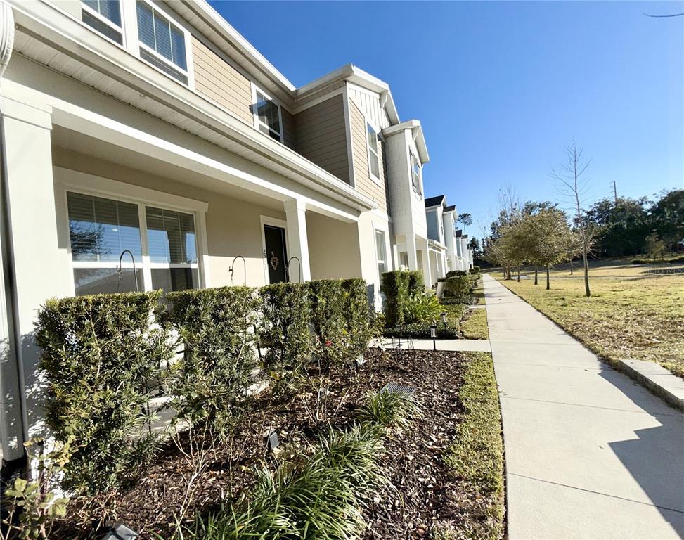 2208 Gopher Tortoise Terrace Oakland, FL 34787 - Photo 4 of 50 a view of a house with a yard
