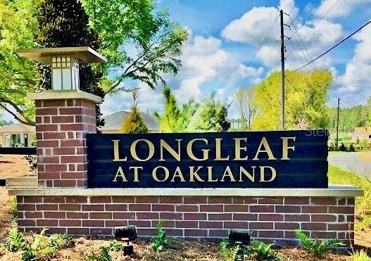 2208 Gopher Tortoise Terrace Oakland, FL 34787 - Photo 44 of 50 a street sign on a brick building